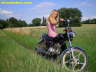 Girl_Suzuki_motorcycles_kickstarting_01L