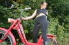Girl_kicstarting_motorcycles_07l